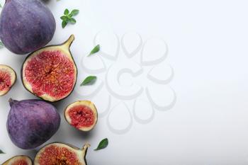 Fresh ripe figs on white background�