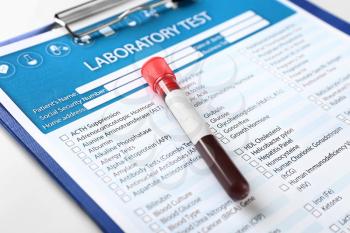 Blood sample on document with result of analyses�