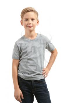 Cute boy in t-shirt on white background�