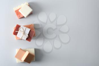 Handmade soap bars on white background, flat lay�