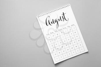 Calendar page of August on grey background�