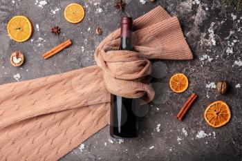 Composition with ingredients for tasty mulled wine on grey background�