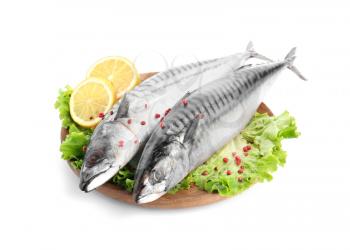 Wooden plate with tasty raw mackerel fish on white background�
