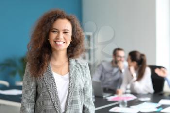 Young businesswoman at meeting in office�