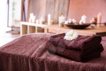 Clean towels on table in spa salon�