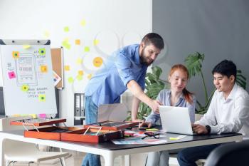 Young IT designers working in office�