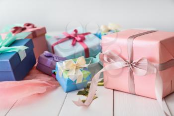 Different gift boxes on white table�