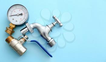 Set of plumbing items on color background�