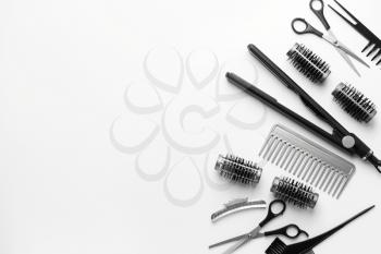 Set of hairdresser tools and accessories on white background�