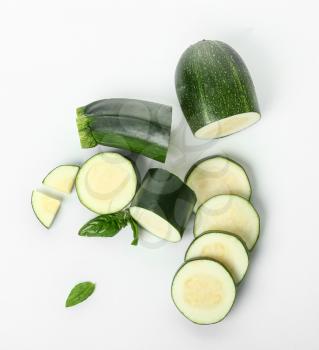 Fresh cut zucchini on white background�