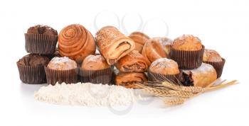 Heap of tasty pastries on white background�