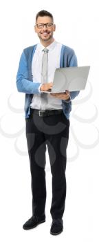 Handsome male teacher with laptop on white background�