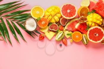 Sweet ripe fruits on color background�