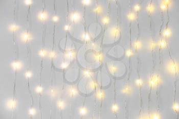 Beautiful Christmas lights on white background�