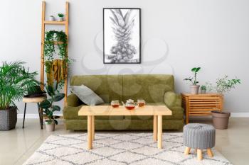 Stylish interior of room with green houseplants�