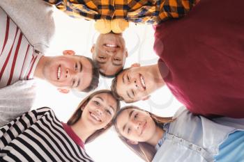 Portrait of teenagers on white background, bottom view�