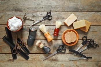Set for male shaving on wooden background�