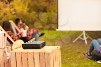 Multimedia DVD projector in outdoor cinema�