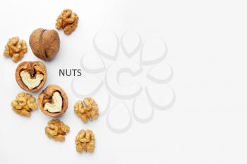 Tasty walnuts on white background�