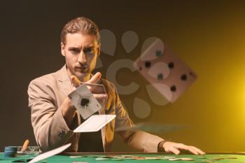 Young man playing in casino�