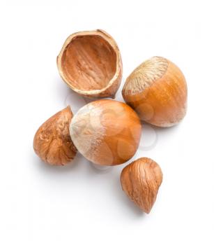 Tasty hazelnuts on white background�