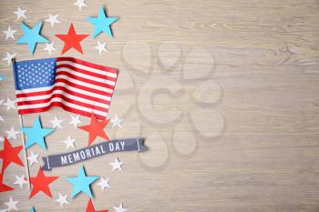 USA flag and stars on wooden background. Memorial Day celebration�