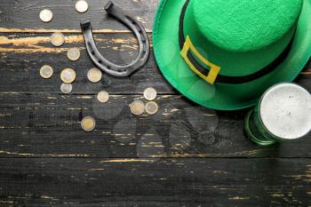 Composition for St. Patrick's Day on wooden background�