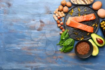 Healthy products rich in omega-3 on wooden background�