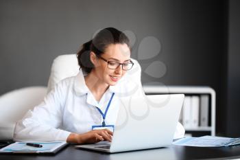 Young female doctor working in clinic�
