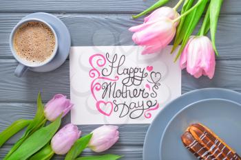 Tasty breakfast for mother on wooden background�