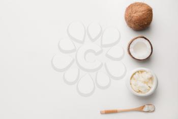 Composition with coconut and butter on light background�
