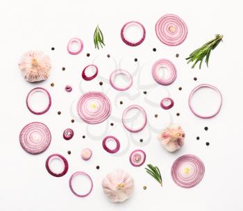 Fresh raw onion and spices on white background�