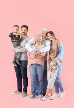 Portrait of big family on color background�