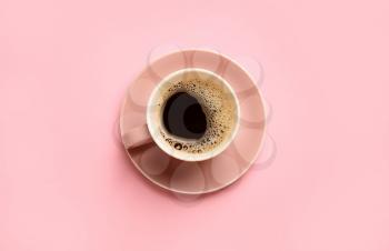 Cup of hot coffee on color background�