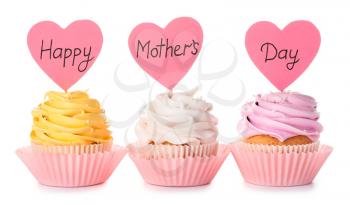 Tasty cupcakes for Mother's Day on white background�