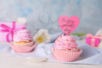 Tasty cupcake for Mother's Day on table�