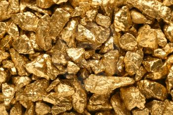 Many gold nuggets as background�