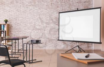 Room with projector prepared for conference in office�