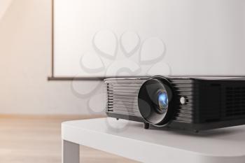 Video projector on table in conference hall, closeup�