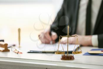 Scales of justice at workplace of notary public�