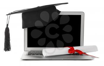 Graduation hat, laptop and diploma on white background�