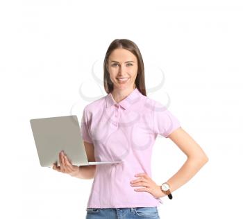Beautiful young woman in stylish polo shirt and with laptop on white background�