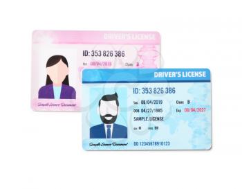 Different driving licenses on white background�