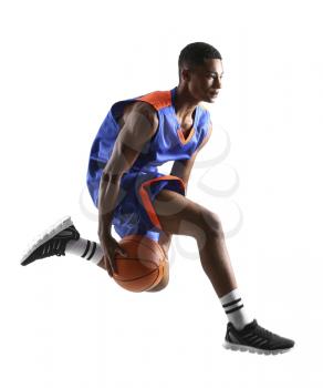 Jumping African-American basketball player on white background�