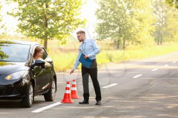 Instructor conducting driver licence test�