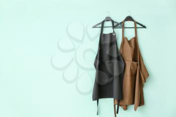 Clean aprons on color background�