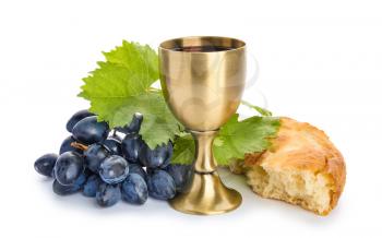 Chalice of wine and bread on white background�