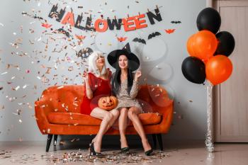 Beautiful young women at Halloween party�