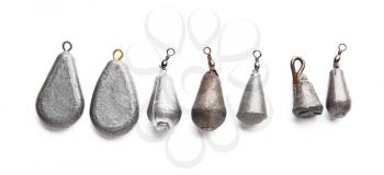 Fishing sinkers on white background�