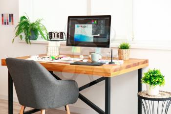 Comfortable workplace of graphic designer in office�